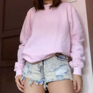 Stylish Woman In Pink Sweater Wallpaper