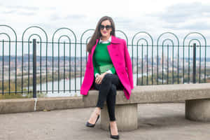 Stylish Woman Wearing Pink Coat On A Spring Day Wallpaper