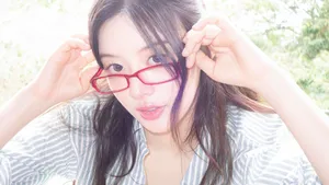 Stylish Woman Wearing Red Glasses Wallpaper