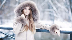 Stylish Woman Wearing Warm Winter Fashion Clothing Wallpaper