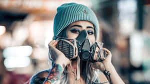 Stylish_ Woman_ With_ Gas_ Mask Wallpaper