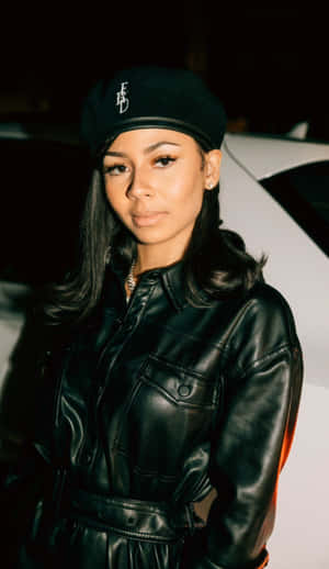 Stylish Womanin Black Leatherand Beret Wallpaper