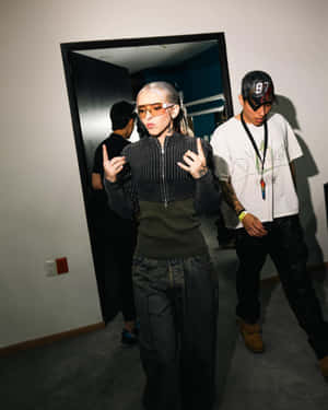 Stylish Youth Corridor Pose Wallpaper