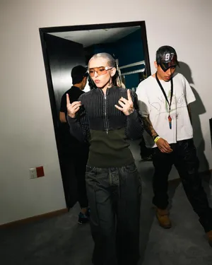 Stylish Youth Corridor Pose Wallpaper