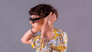 Stylish Youth Sunglasses Pose Wallpaper