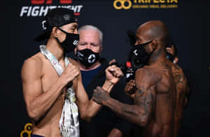 Su Mudaerji And Malcolm Gordon Posing Wallpaper