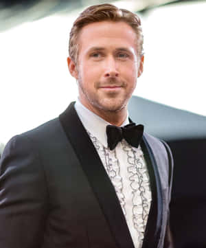 Suave Ryan Gosling Smiling [wallpaper] Wallpaper