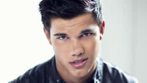 Suave Taylor Lautner [wallpaper] Wallpaper