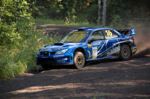 Subaru Impreza W R C Rally Action Wallpaper