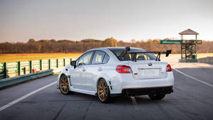 Subaru With Gold Rims Wallpaper