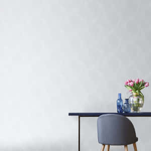 Subtle Set Up Of A Table And Chair Wallpaper
