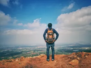 Successful Man In Backpack Wallpaper