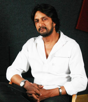 Sudeep Sits In A Studio Wallpaper