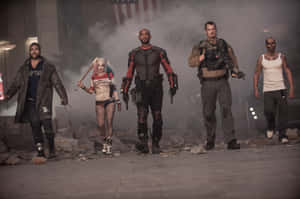 Suicide Squad Team Walking Through Rubble Wallpaper