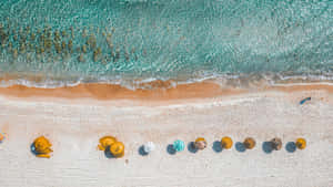 Summer Beach Aerial Viewwith Colorful Umbrellas Wallpaper