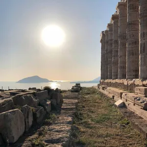 Sun In Sky Over Sounion Wallpaper
