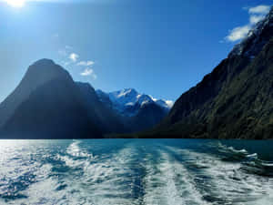 Sun Shining Over Milford Sound Wallpaper