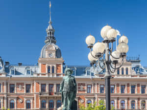 Sundsvall Historic Buildingand Statue Wallpaper