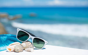 Sunglasses And Shells Wallpaper