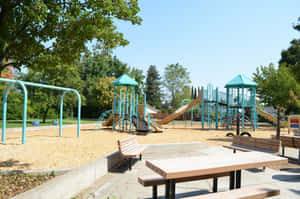 Sunny Day Playground Scene Wallpaper