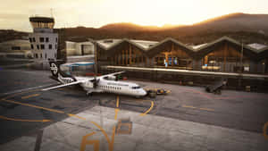 Sunset Airportwith Air New Zealand Aircraft Wallpaper