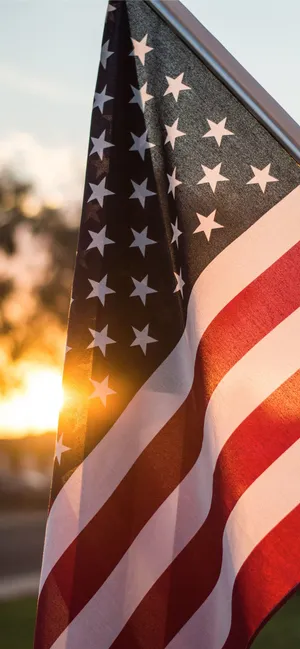 Sunset Behind Flag Of America Iphone Wallpaper