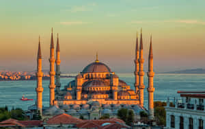 Sunset Blue Mosque With Ocean Wallpaper