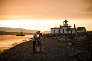Sunset Embraceat Discovery Park Lighthouse Wallpaper
