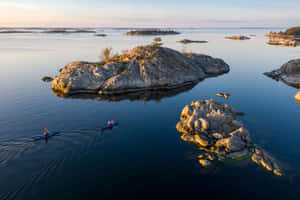 Sunset Kayaking Archipelago Wallpaper