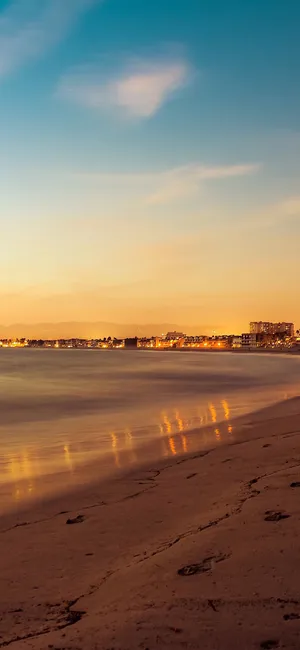 Sunset Ocean Distant Town Wallpaper