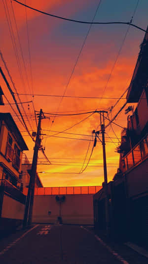 Sunset Orange Skyline Alley Wallpaper