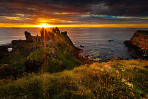 Sunset Over Cliff Ireland Desktop Wallpaper