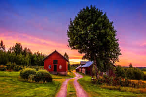 Sunset Over Idyllic Farmhouse Wallpaper