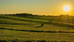 Sunset Over Rolling Farmland Wallpaper