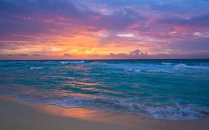 Sunset_ Over_ Turquoise_ Waves_4 K_ U H D Wallpaper