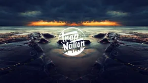 Sunset Over Waterwith Trap Nation Logo Wallpaper