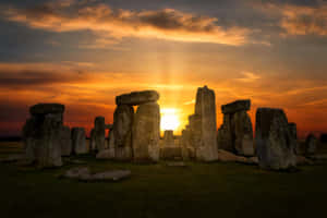 Sunset Peeks Through Stonehenge Wallpaper