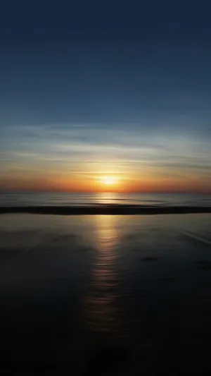 Sunset Reflection 900 X 1600 Wallpaper Wallpaper