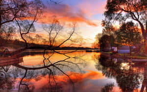 Sunset Reflection On Calm Waters Wallpaper