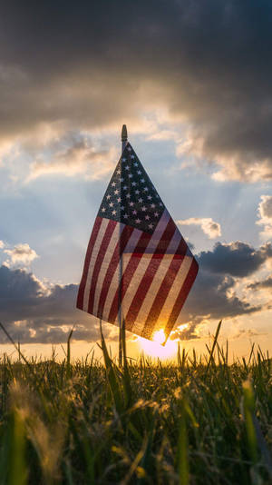 Sunset Sky Behind Flag Of America Iphone Wallpaper