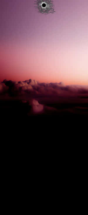 Sunset Skywith Cracked Screen Texture Wallpaper