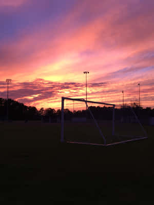 Sunset Soccer Field Silhouette Wallpaper