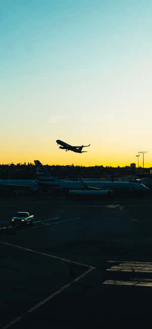 Sunset_ Takeoff_ Silhouette.jpg Wallpaper