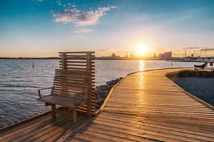 Sunset View Over Waterfrontin Vasteras Sweden Wallpaper