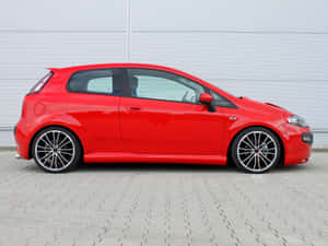 Superb View Of A Sleek Fiat Grande Punto Wallpaper
