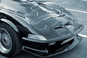 Supercharger On A Muscle Car Hood Wallpaper