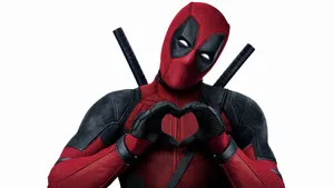 Superhero Deadpool Sending Love Wallpaper