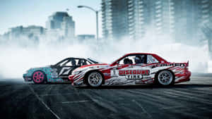 Supra Drift Two Cars In City Wallpaper