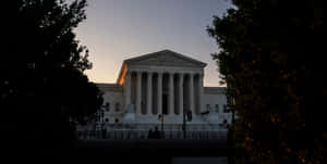 Supreme Court Building In Between Trees Wallpaper