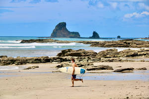 Surfer In Nicaragua Island Wallpaper